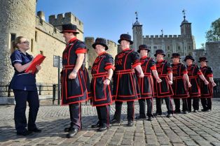 Beefeaters at the Tower of London roll their sleeves up to give blood as part of a drive to build stocks ahead of the Olympics. (PRNewsFoto/NHS Blood and Transplant)