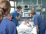 Patient undergoing critical care in hospital bed