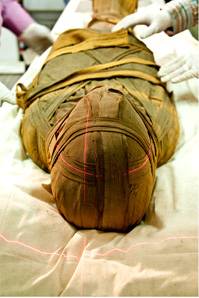 A mummy being prepared for a scan